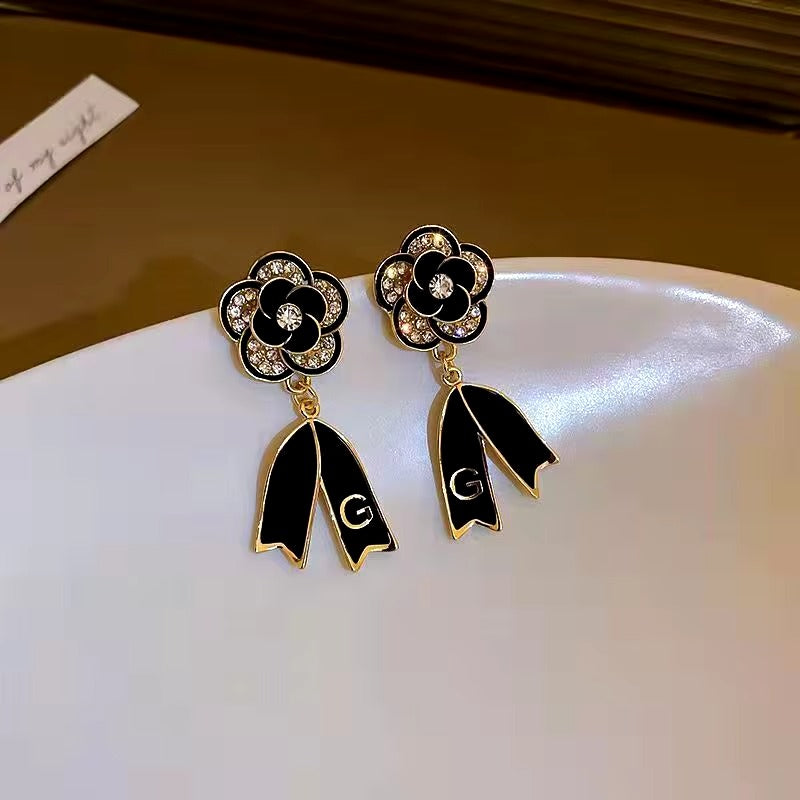 Black Camelia Bow Letter Earrings