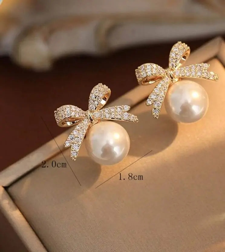 Elegant AD Studded Bow Earrings with Pearl Drop