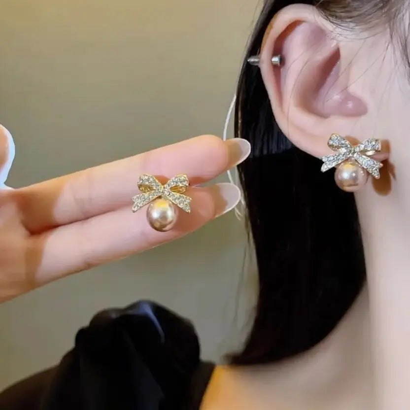 Elegant AD Studded Bow Earrings with Pearl Drop