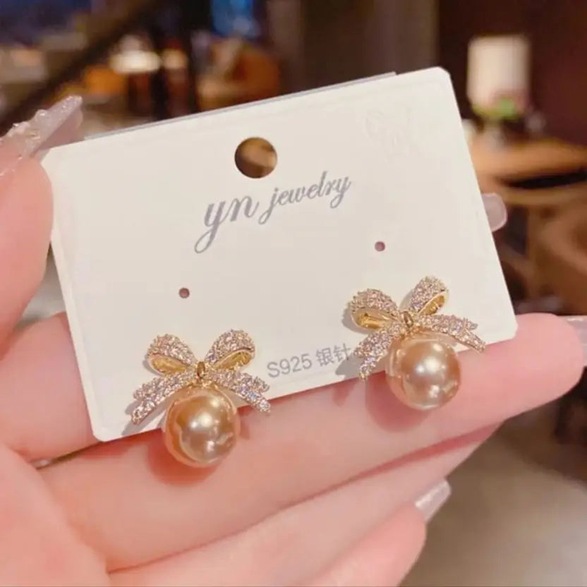 Elegant AD Studded Bow Earrings with Pearl Drop